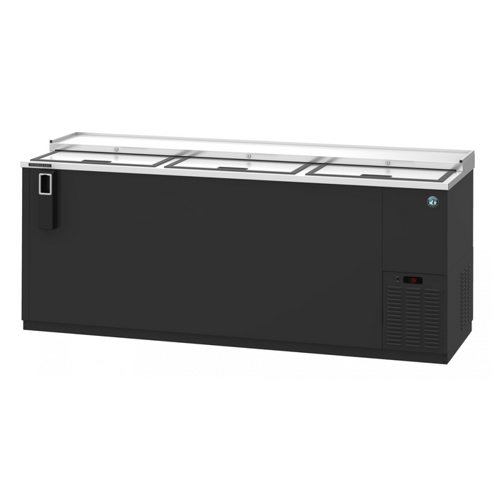 Three section black vinyl back bar bottle cooler with slide top doors.