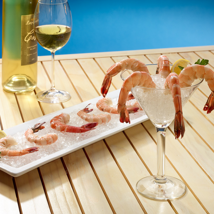 Shrimp cocktail and seafood display on flaked ice made by Hoshizaki F-801MWJ.