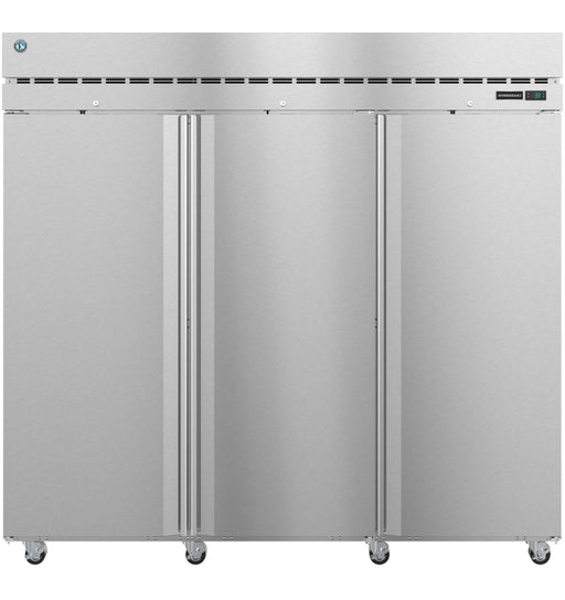 Three-section stainless steel upright freezer with lock.