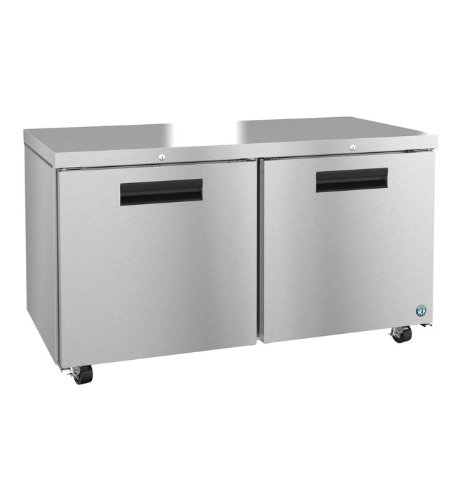 Stainless steel Hoshizaki UF60B-01 two-section undercounter freezer with lockable doors.