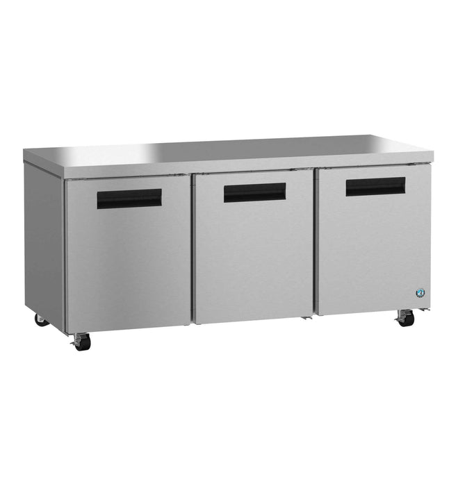 Three-section undercounter refrigerator with stainless steel doors and casters.